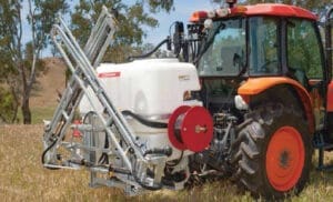 Tractor chemical boom spray
