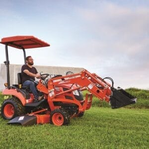 Kioti CS2610 and Mid-Mount Mower