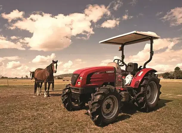 Case 60B rops tractor on a horse farm