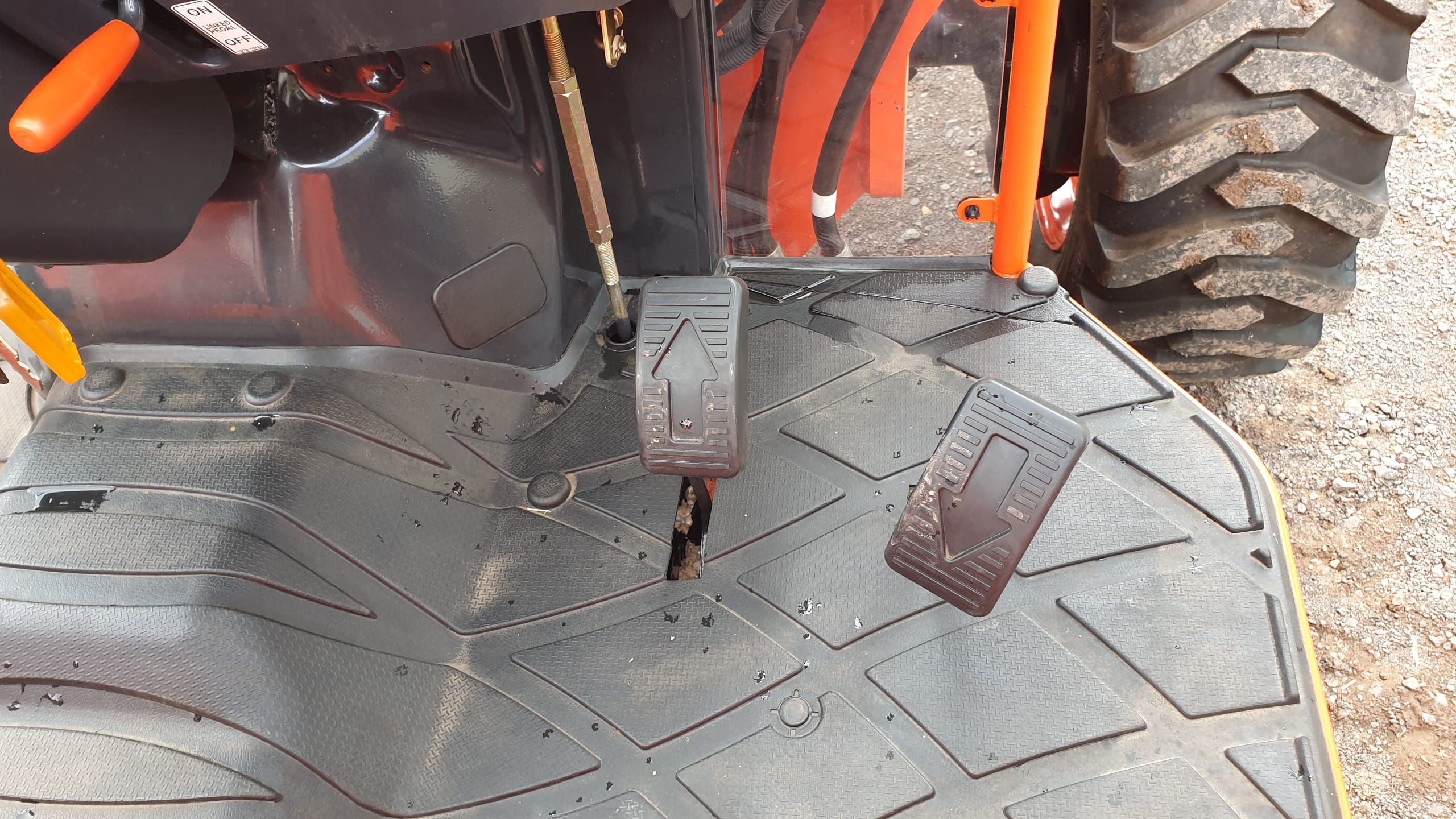 Kioti DK HST peddle configuration with forward and reverse