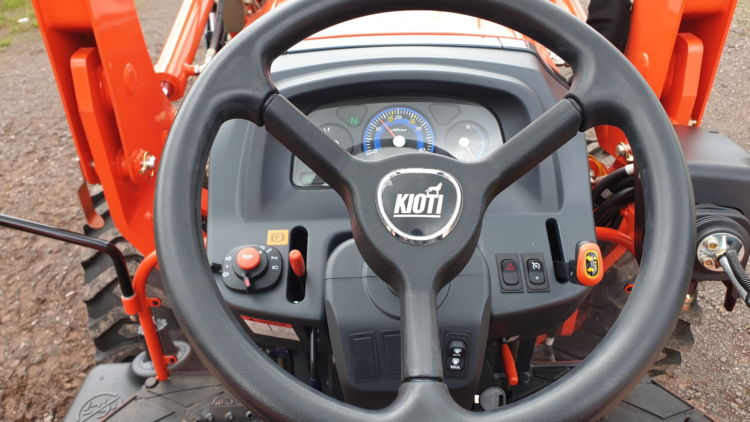 Kioti DK Series steering wheel and dash view