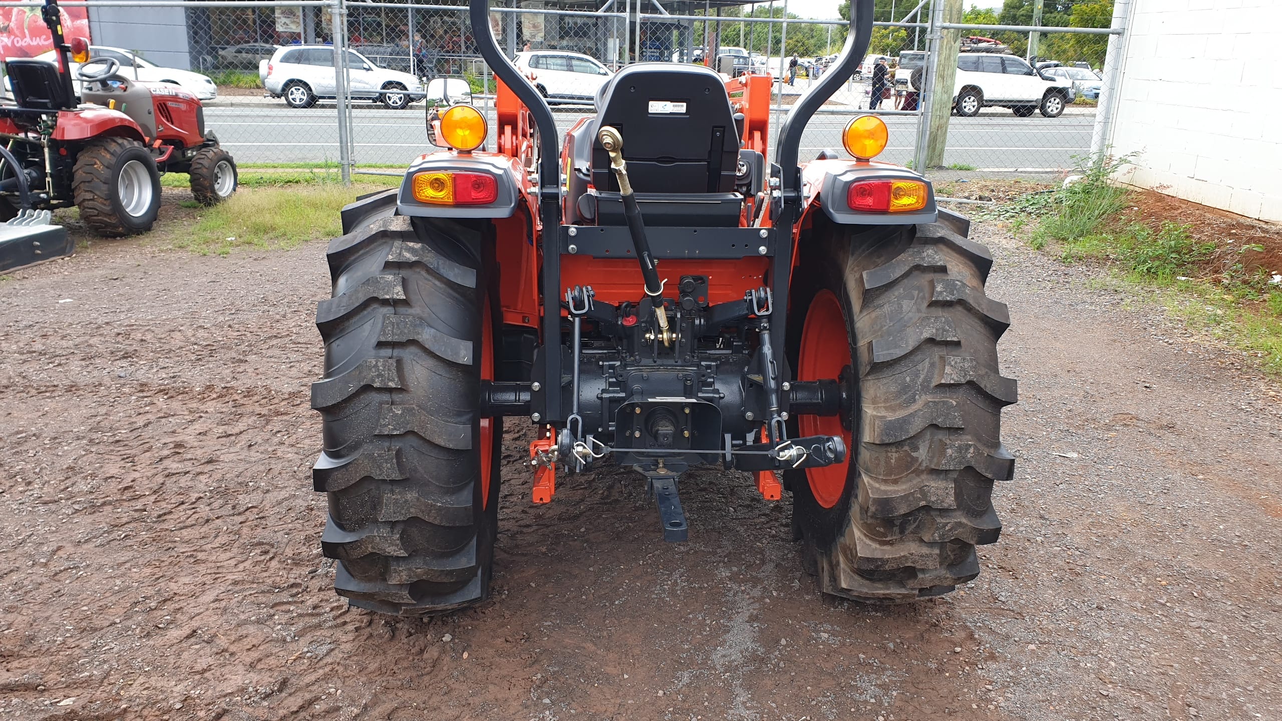 Kioti DK series rear photo showing linkage and hydraulic connections