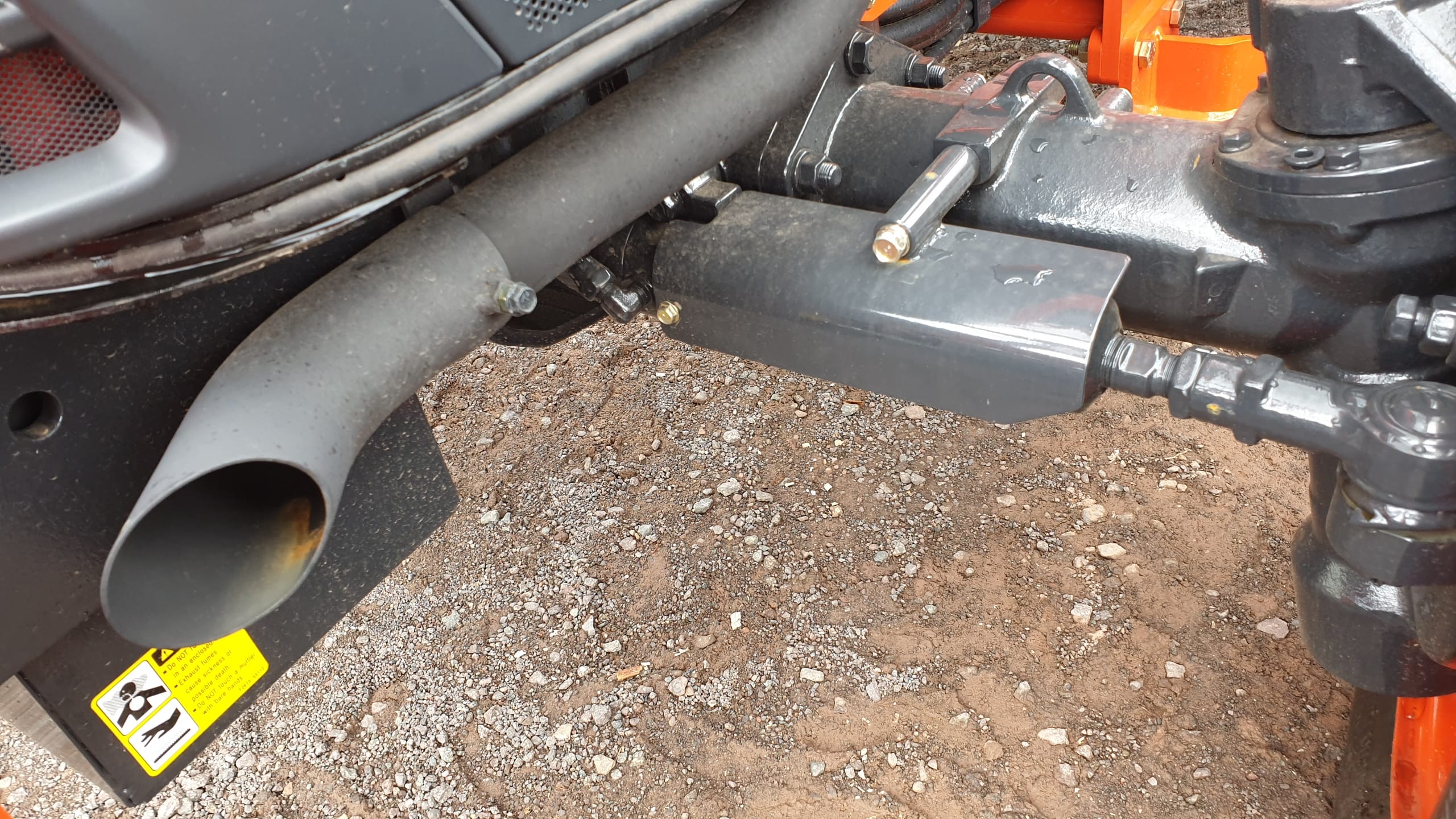 Kioti DK 4wd front axle with down swept exhaust